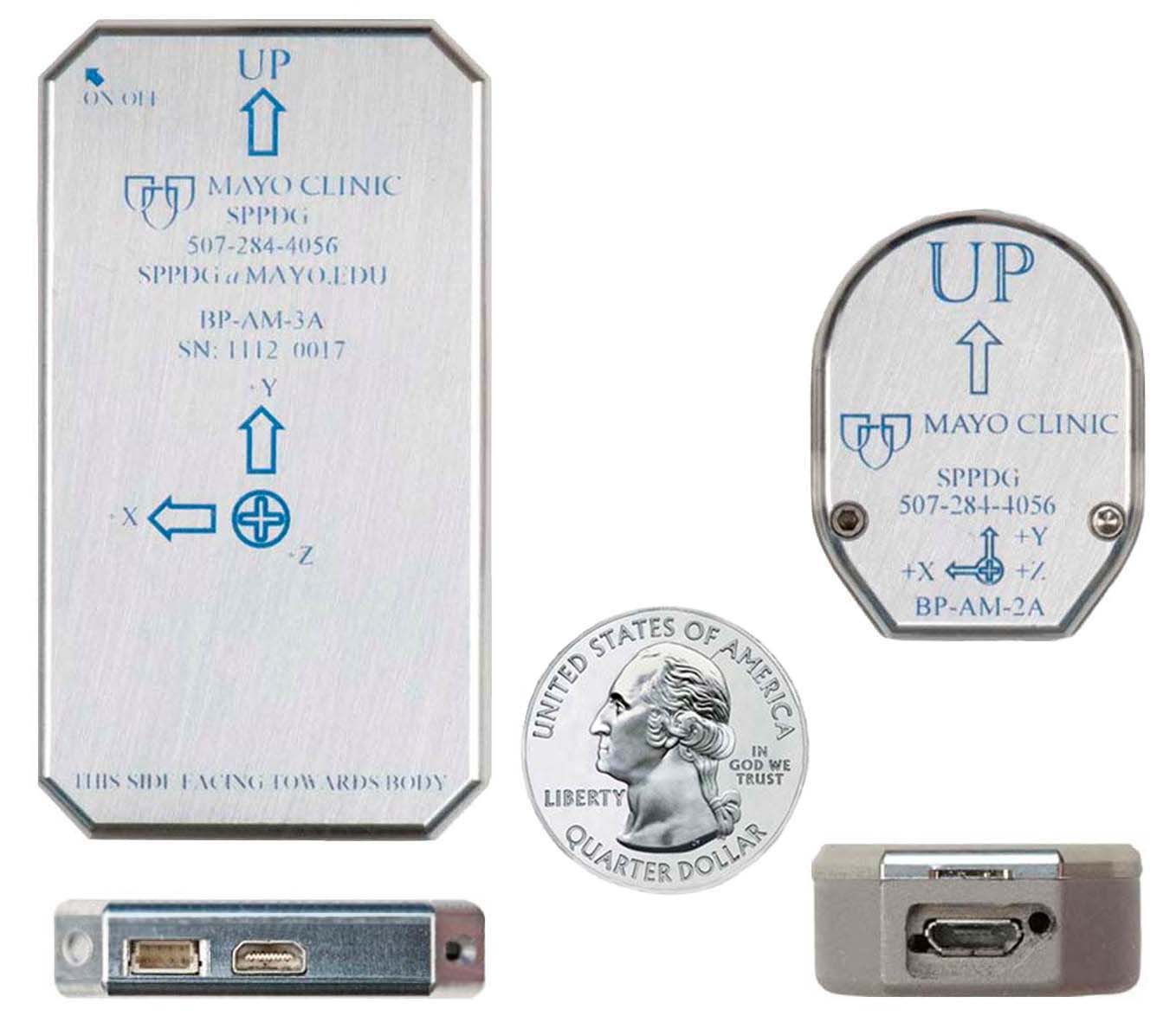 Two versions of body-worn physiological monitoring unit developed by this research and development group.